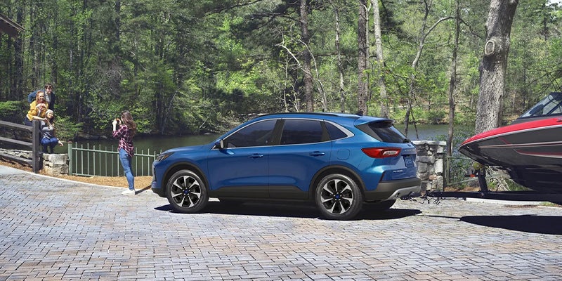 2023 Ford Escape parked with boat