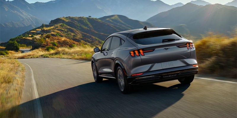 2023 Ford Mustang Mach-E parked driving on road