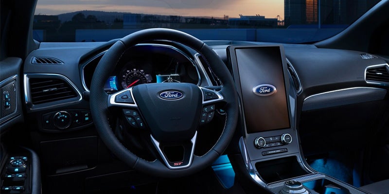 Ford car interior with steering wheel and touchscreen display